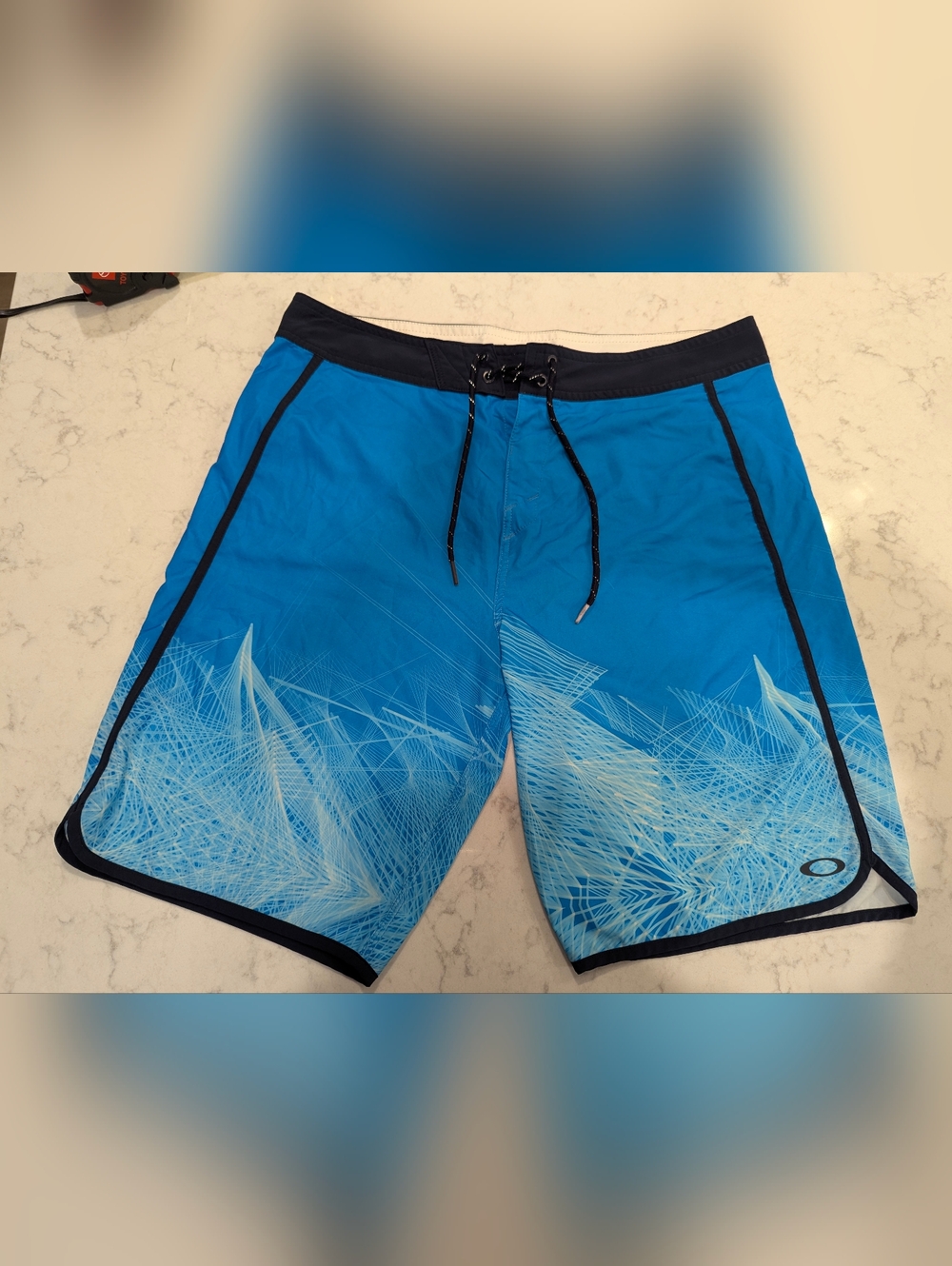 Oakley Light Blue and Bright Blue Swim Trunks